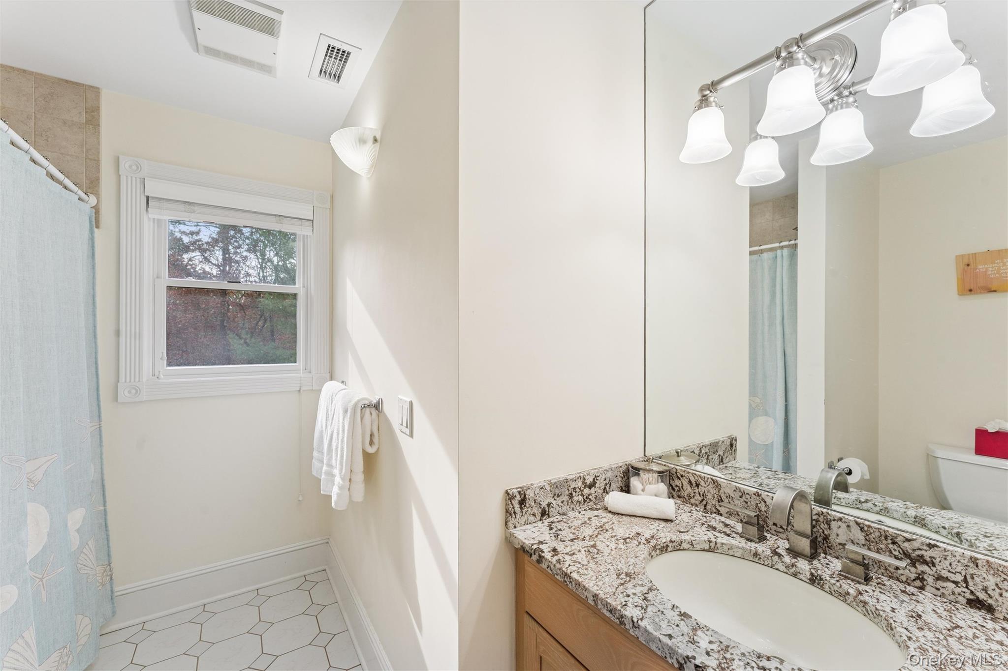 3 Cherry Blossom Lane, East Quogue, NY 11942