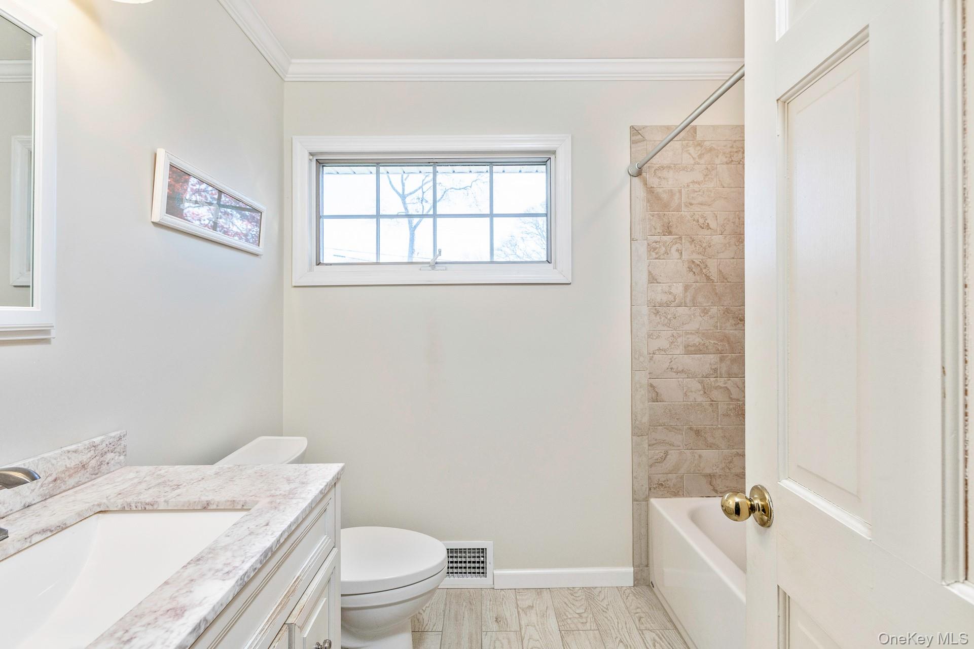 14 Whiting Road, East Quogue, NY 11942