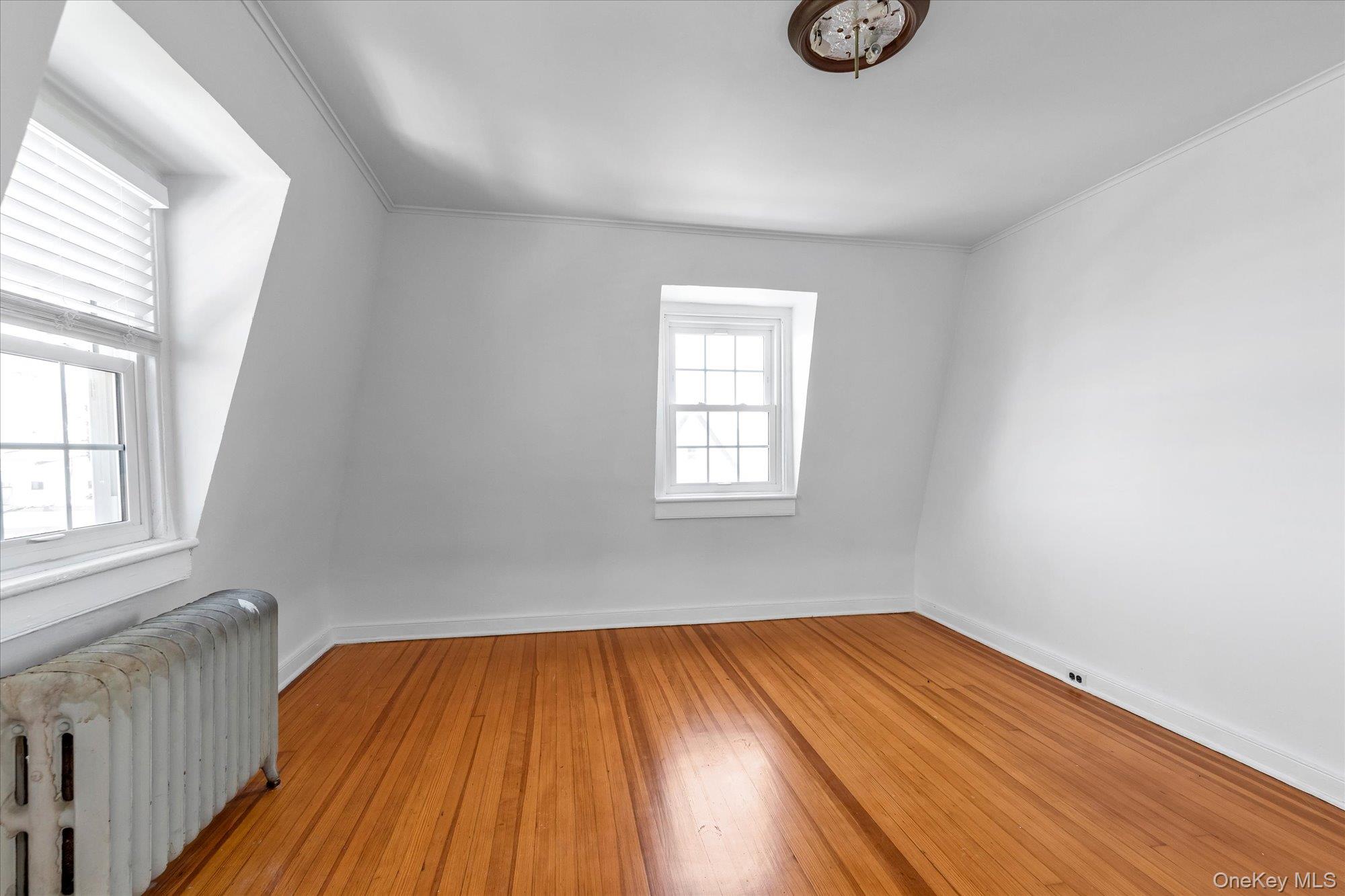 39-26/24 213 Street, Bayside, NY 11361