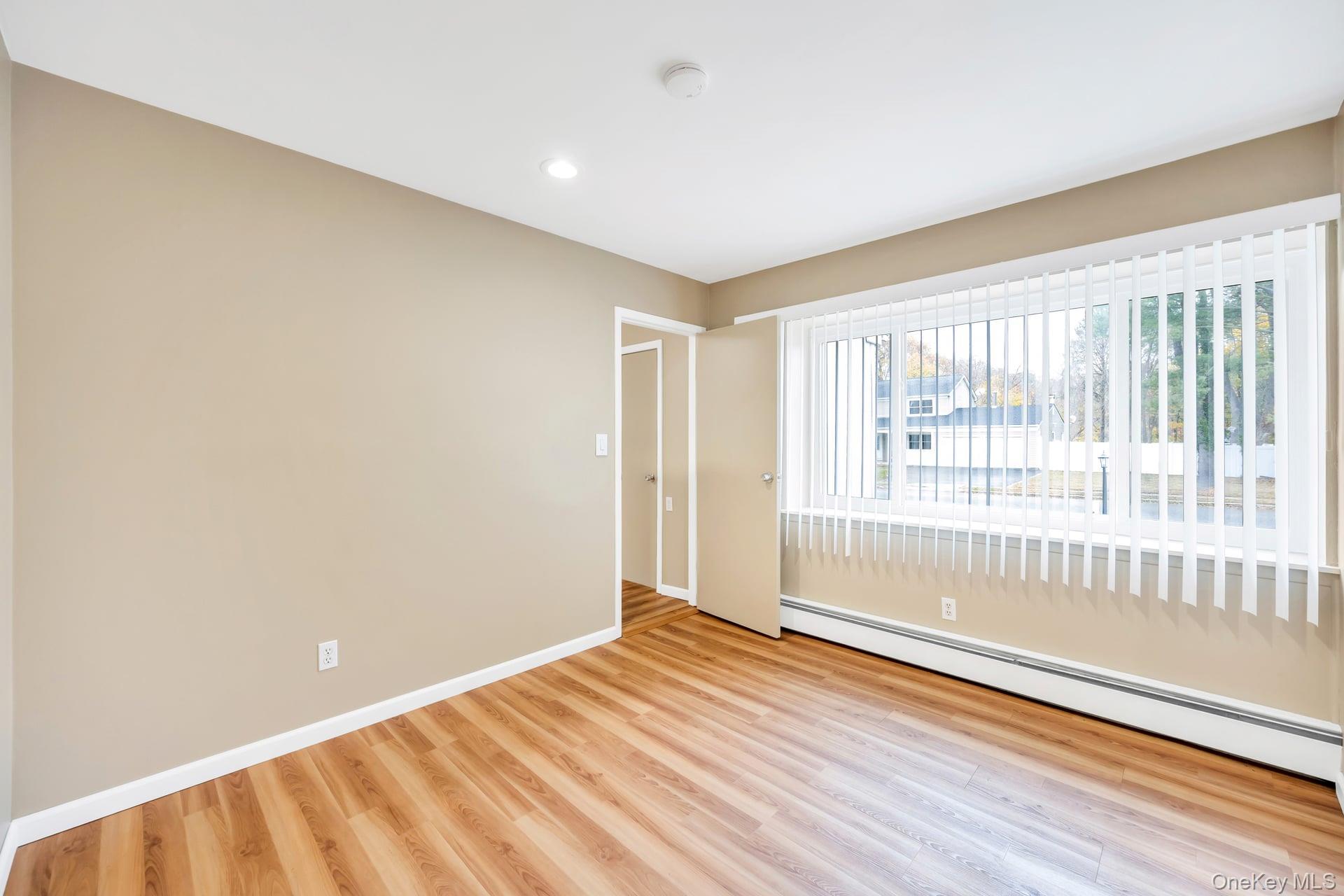 2 Tulip Grove Drive, Lake Grove, NY 11755