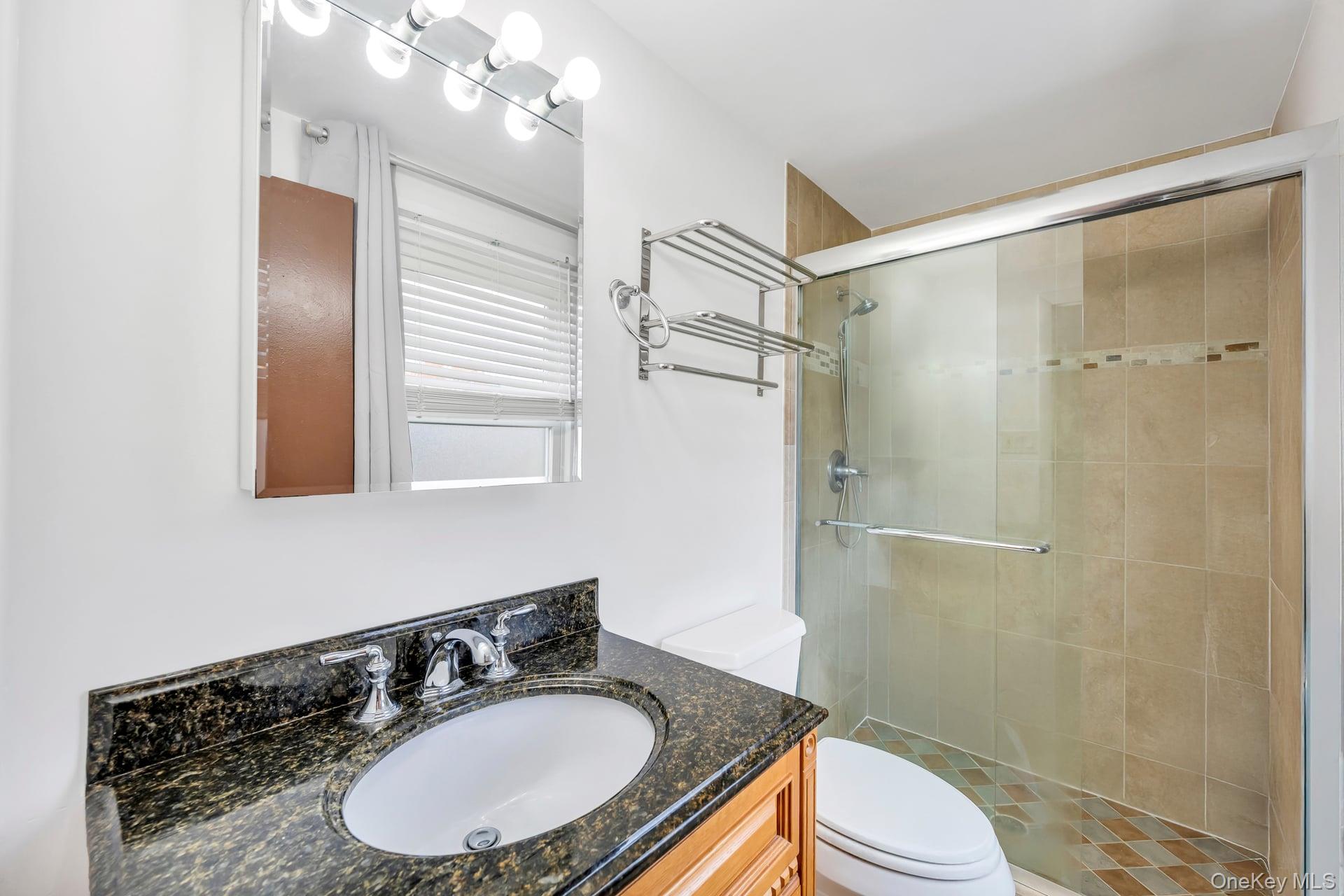 2 Tulip Grove Drive, Lake Grove, NY 11755