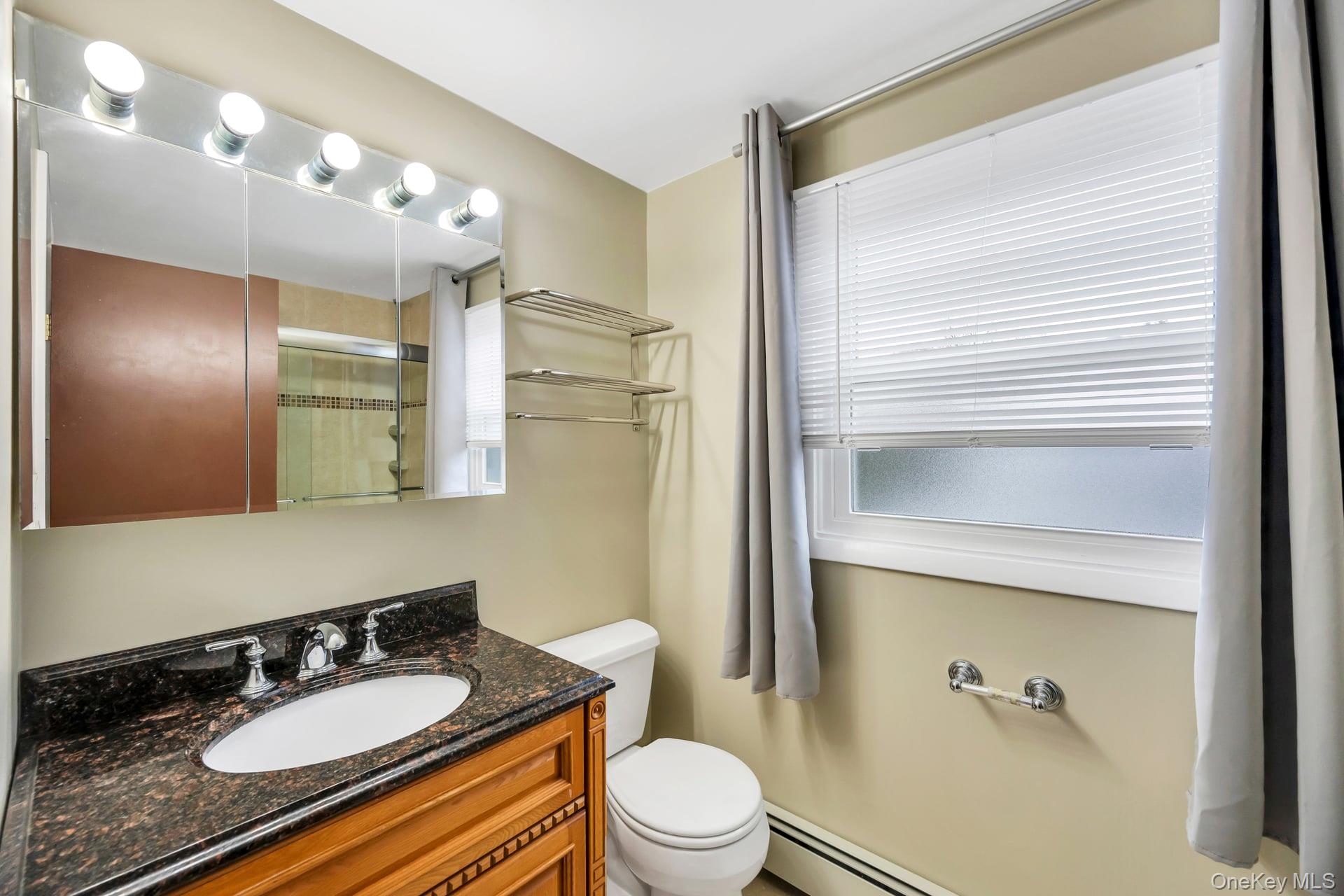 2 Tulip Grove Drive, Lake Grove, NY 11755