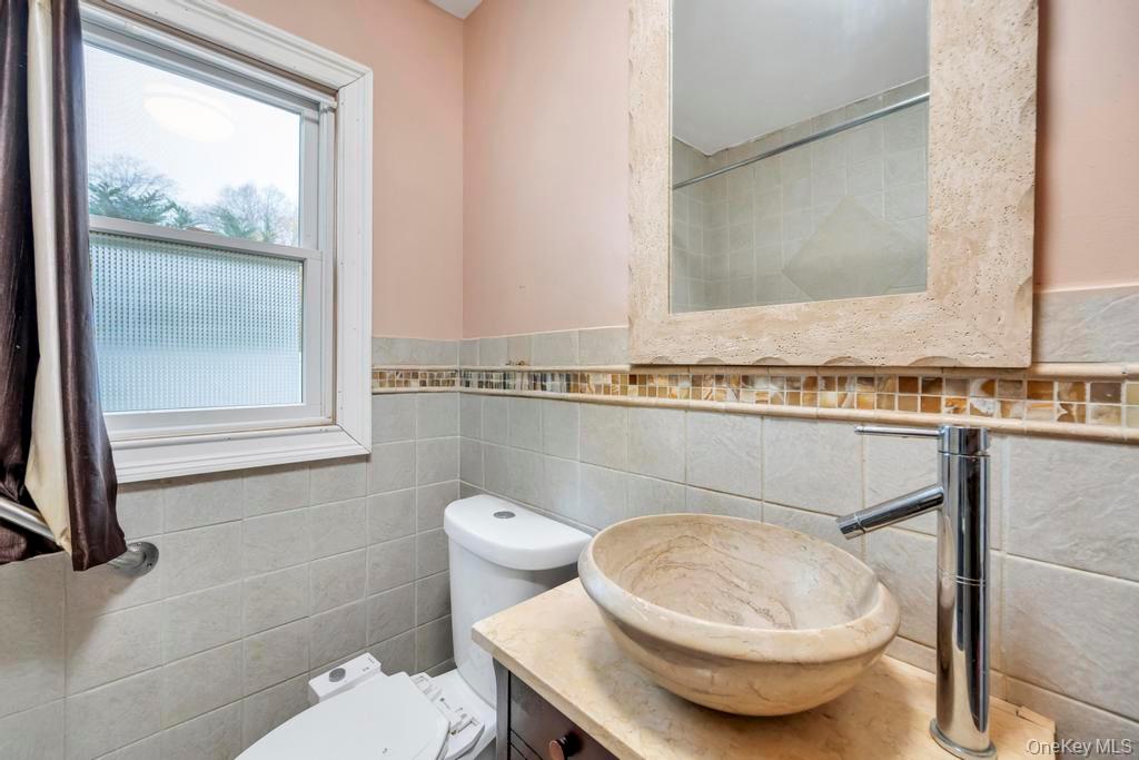 277 Clocks Boulevard, East Massapequa, NY 11758