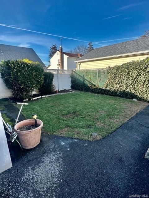 63 Elmwood Avenue, Hempstead, NY 11550