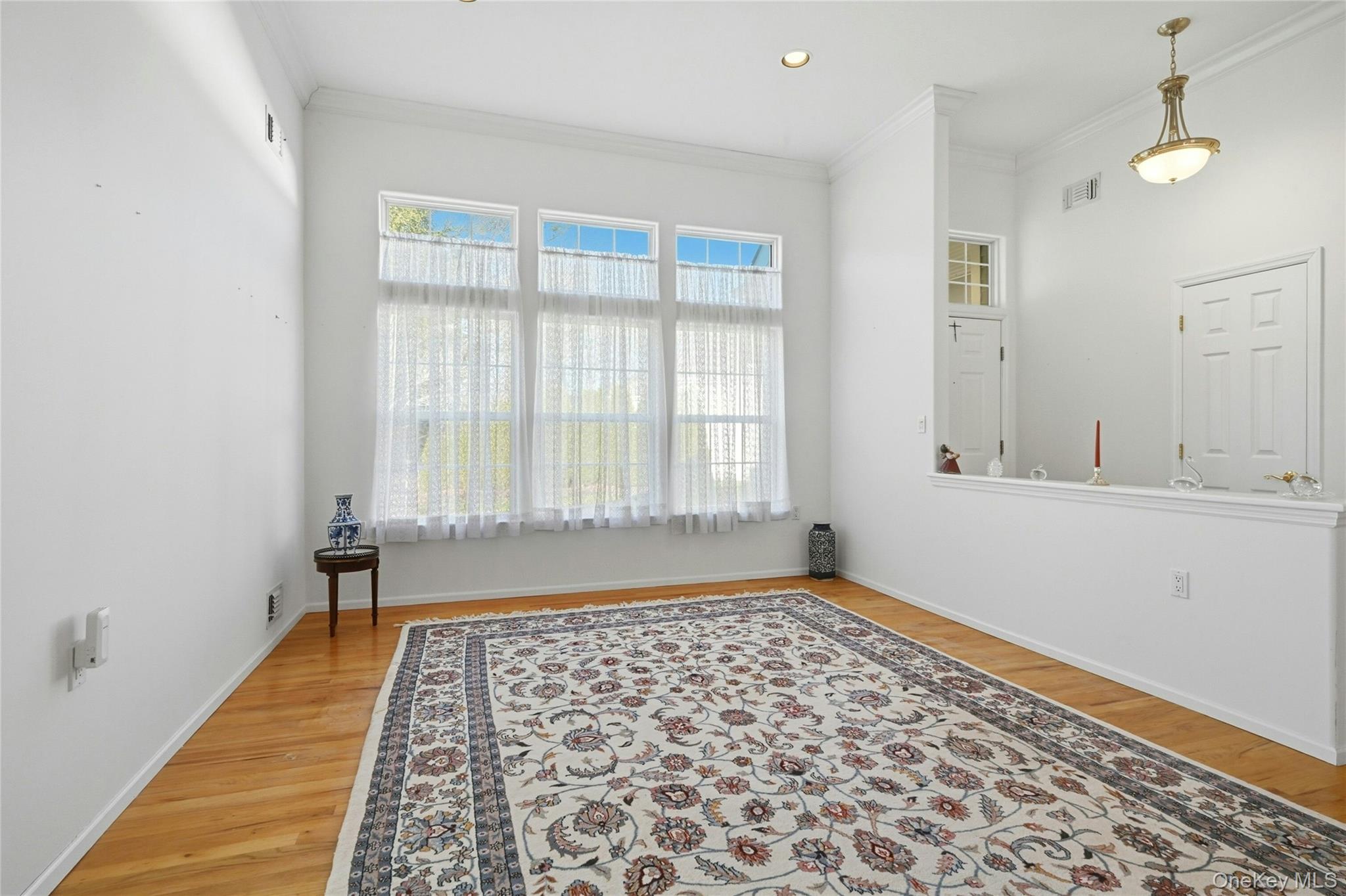 10 Sagaponack Court # 10, Ridge, NY 11961