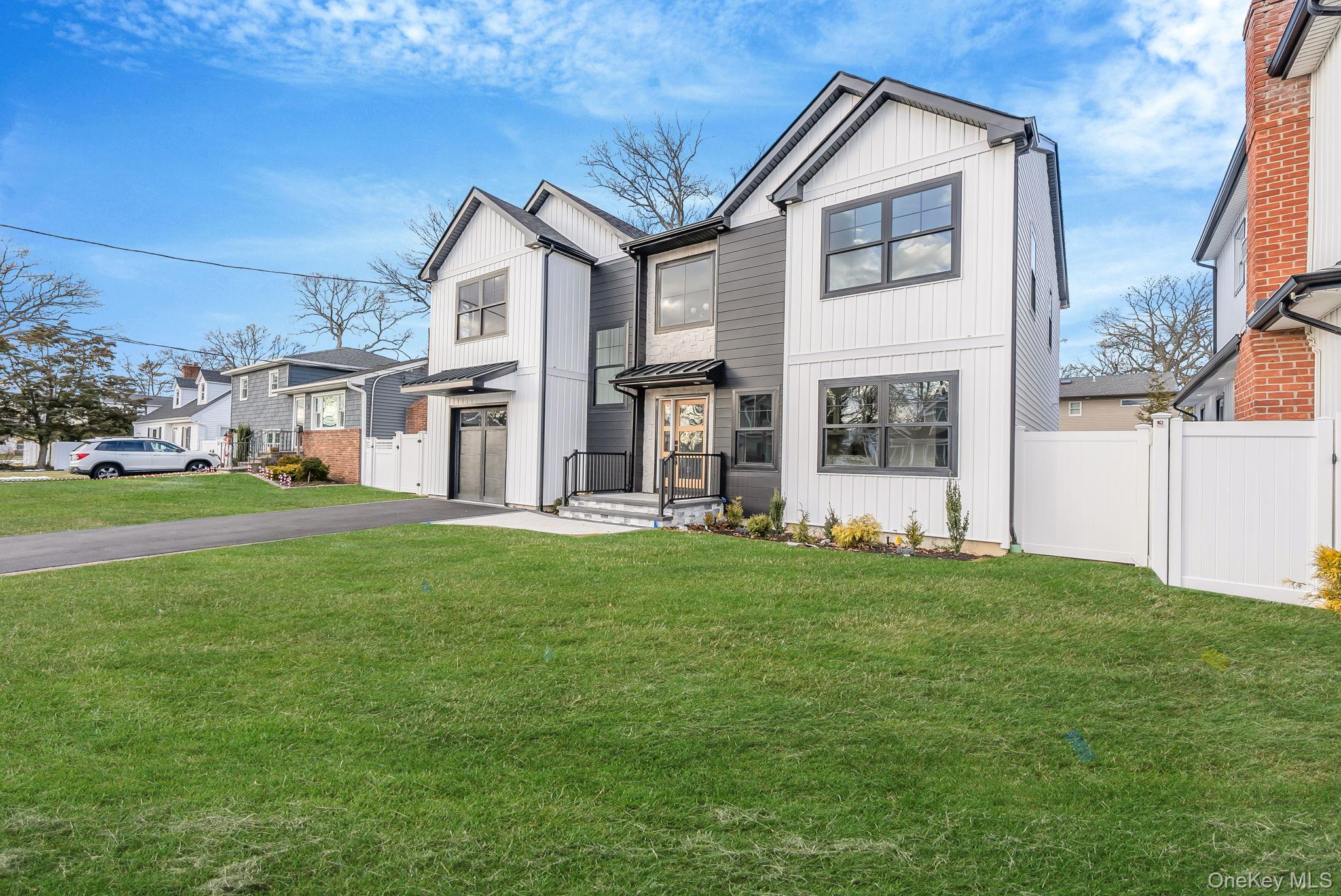 63 Harmony Drive, Massapequa Park, NY 11762