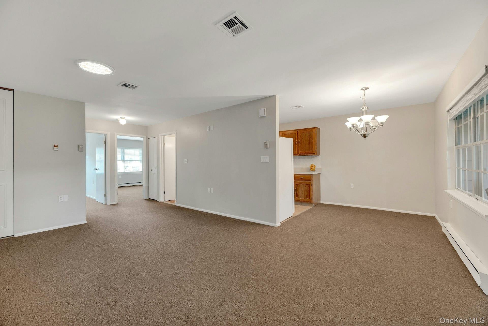 164 Falmouth Court # E, Ridge, NY 11961