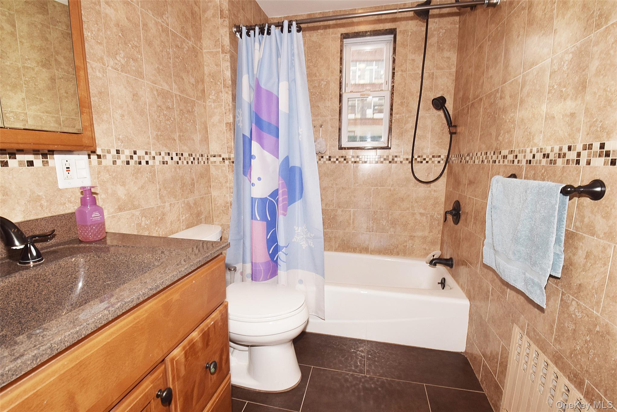 7216 66th Drive, Middle Village, NY 11379