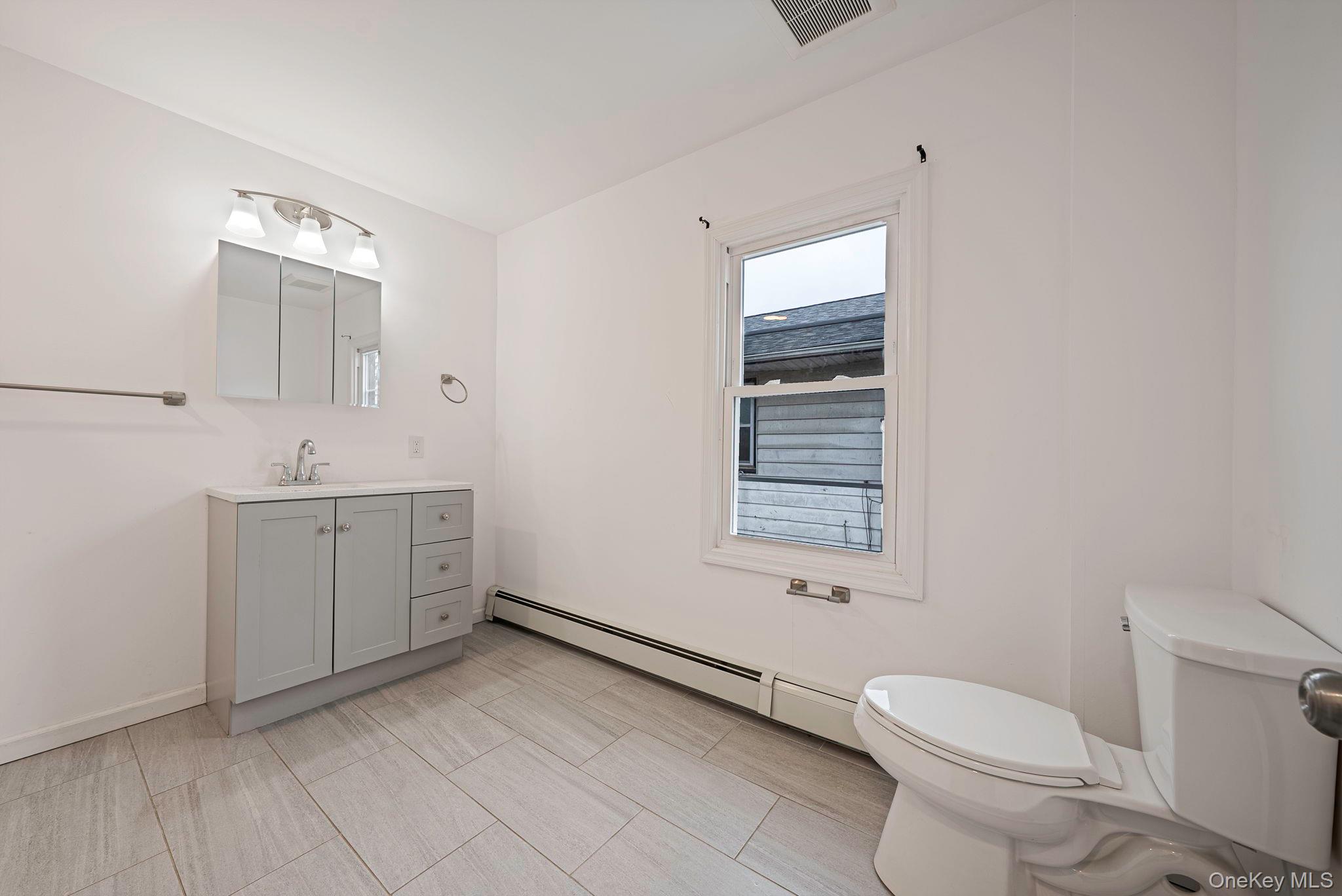 63 Devon Road, Hempstead, NY 11550