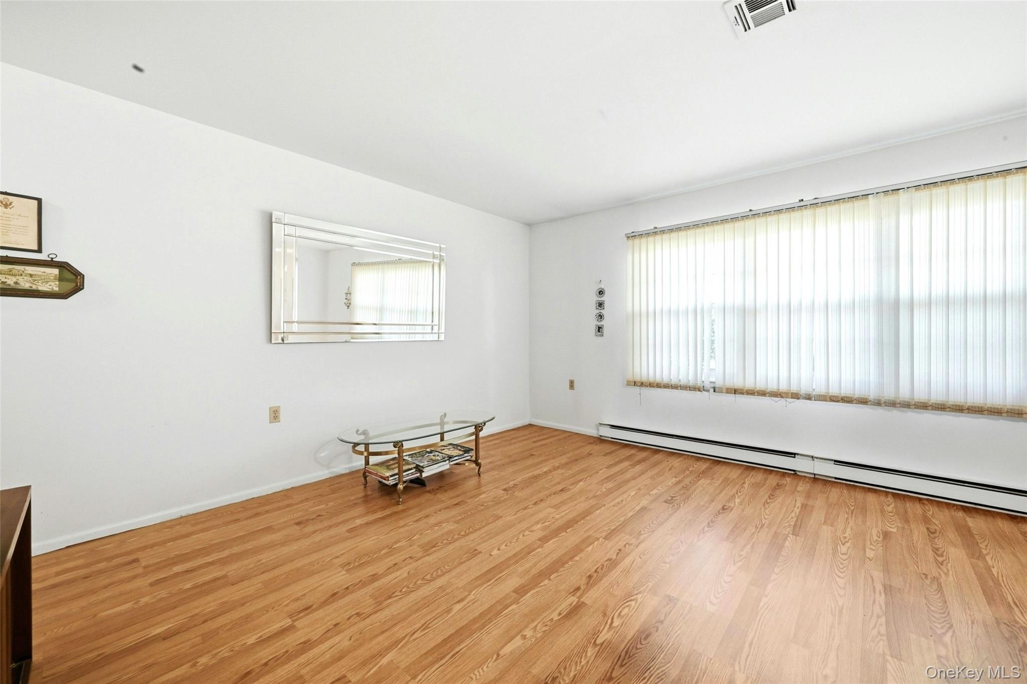 128D Exmore Court, Ridge, NY 11961