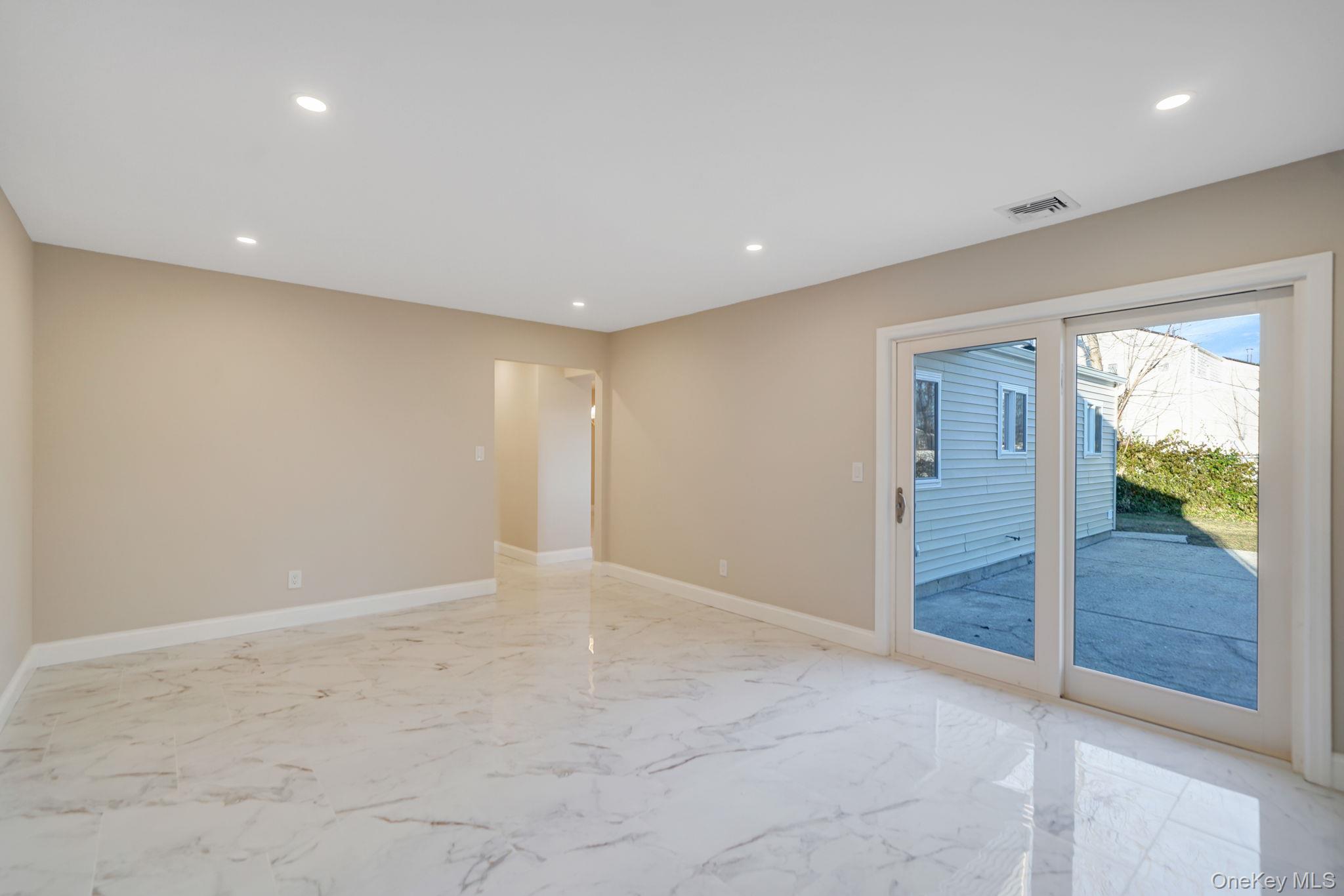 12 Chelmsford Drive, Wheatley Heights, NY 11798