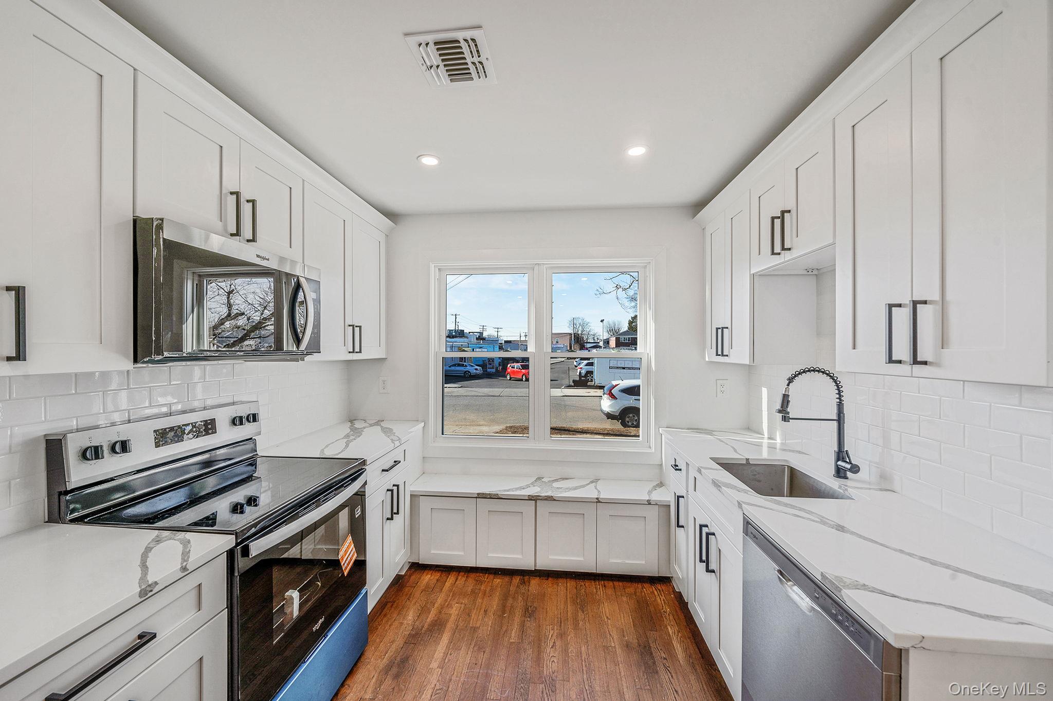 8 Rockaway Avenue, Westbury, NY 11590