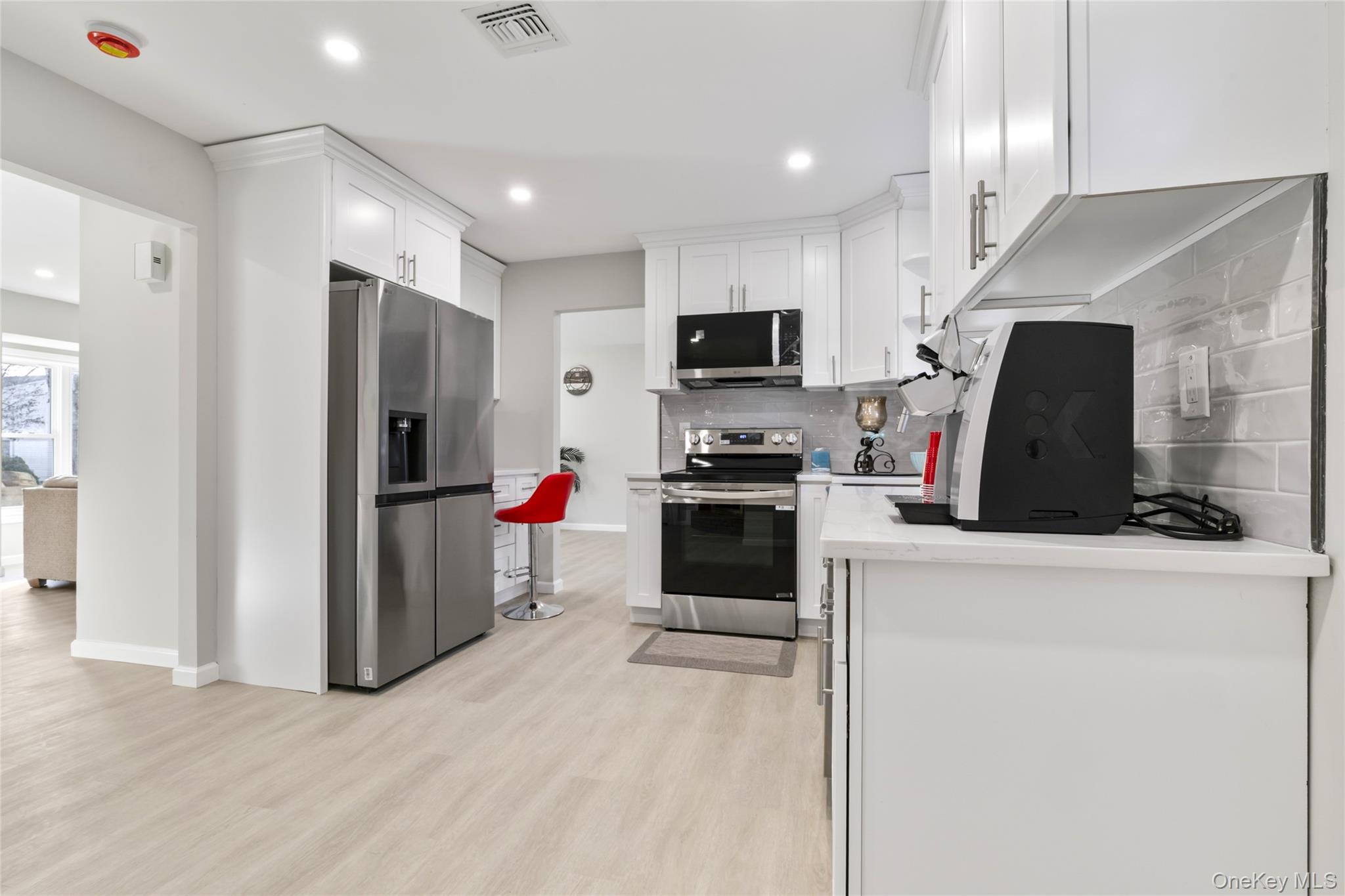 15 Bellaire Drive, Ridge, NY 11961