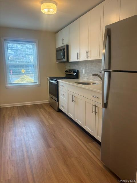 48 Reservoir Avenue, Northport, NY 11768