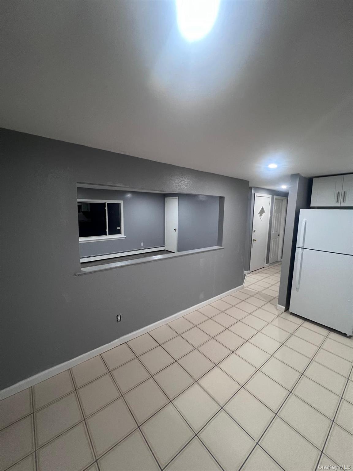 1371 Rosser Avenue, Elmont, NY 11003