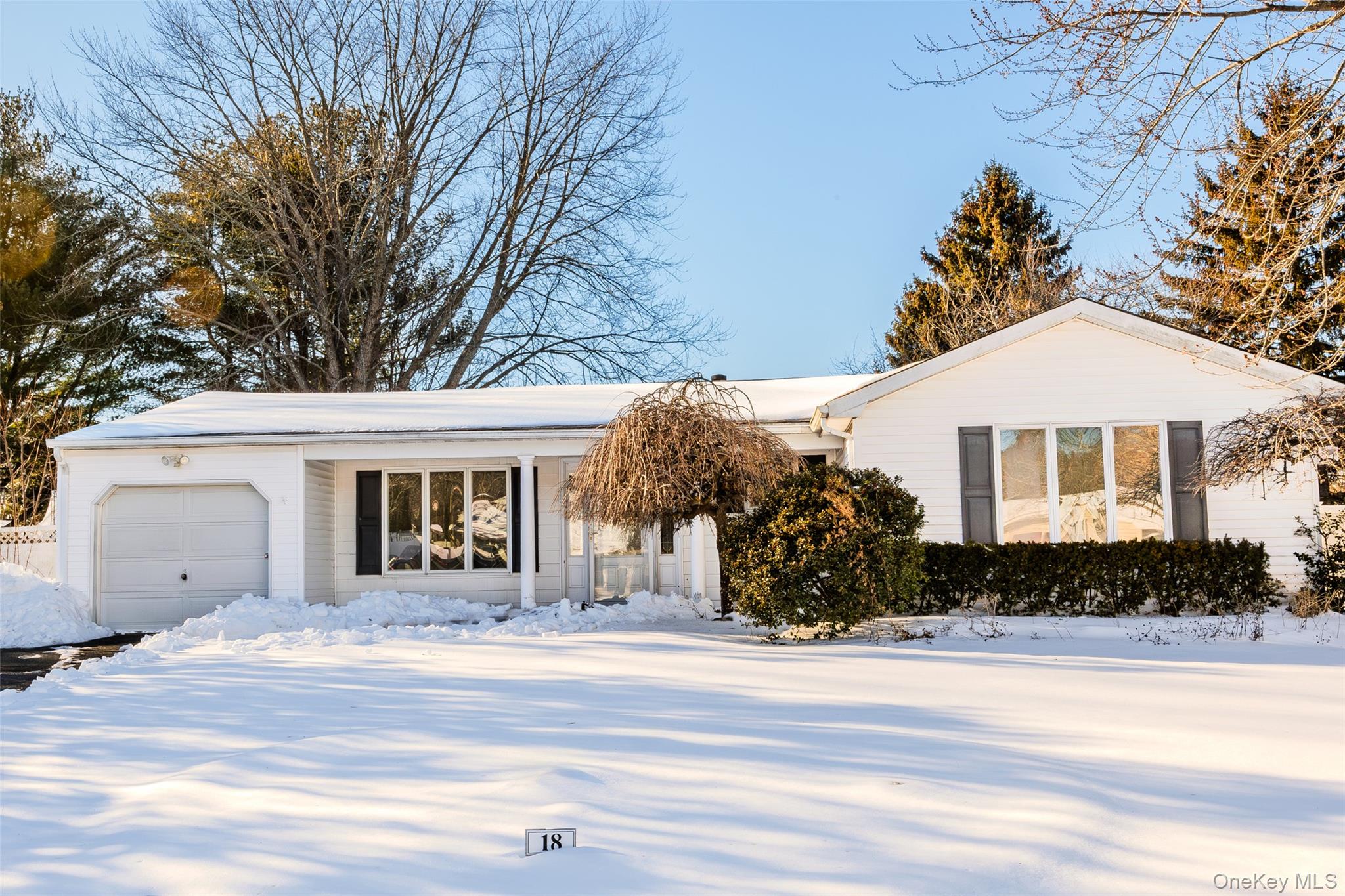 18 Woodbrook Drive, Ridge, NY 11961