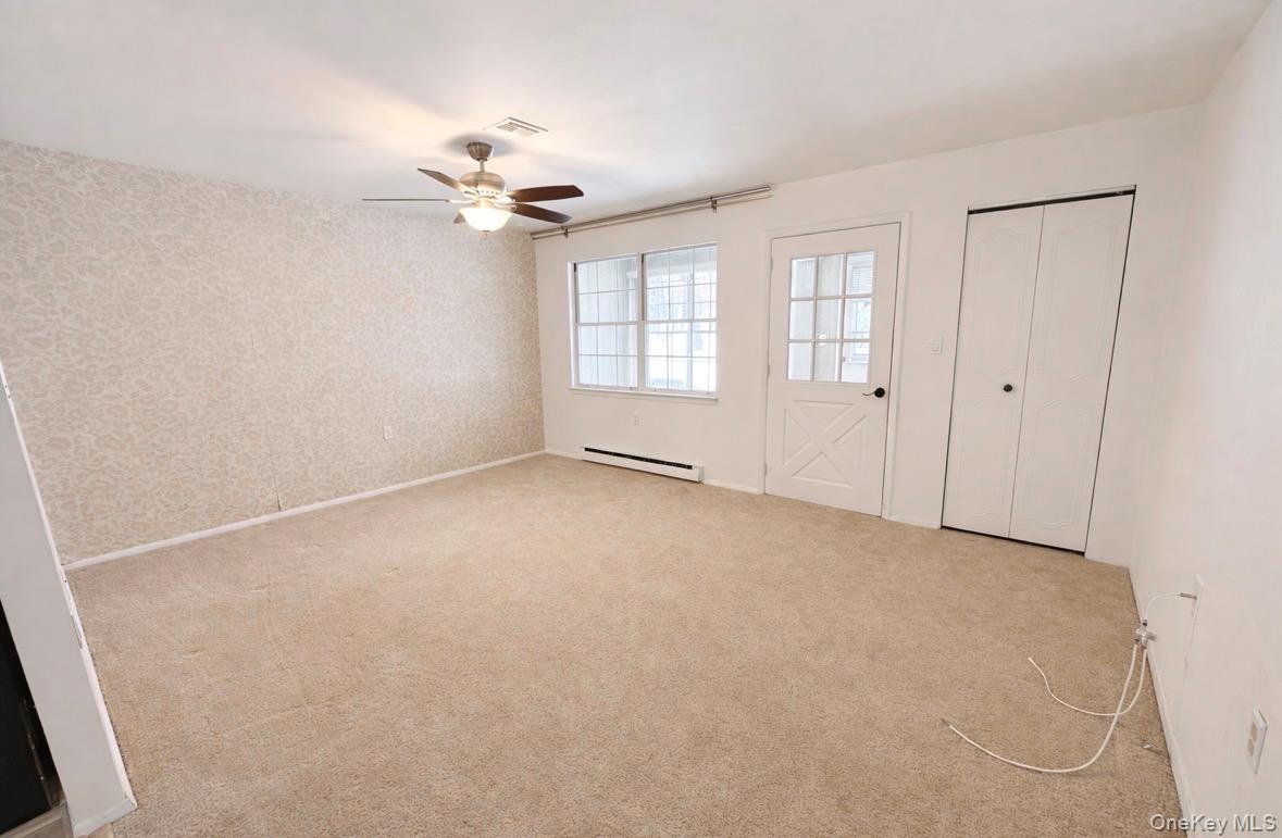 306 Torquay Court # E, Ridge, NY 11961