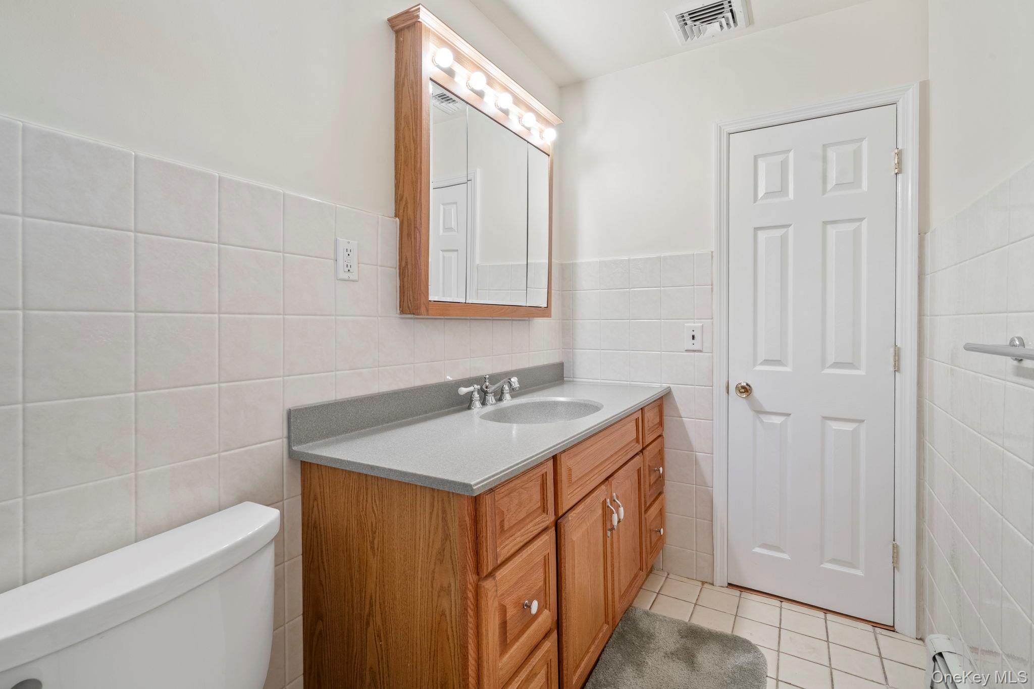 15 Thadford Street, East Northport, NY 11731