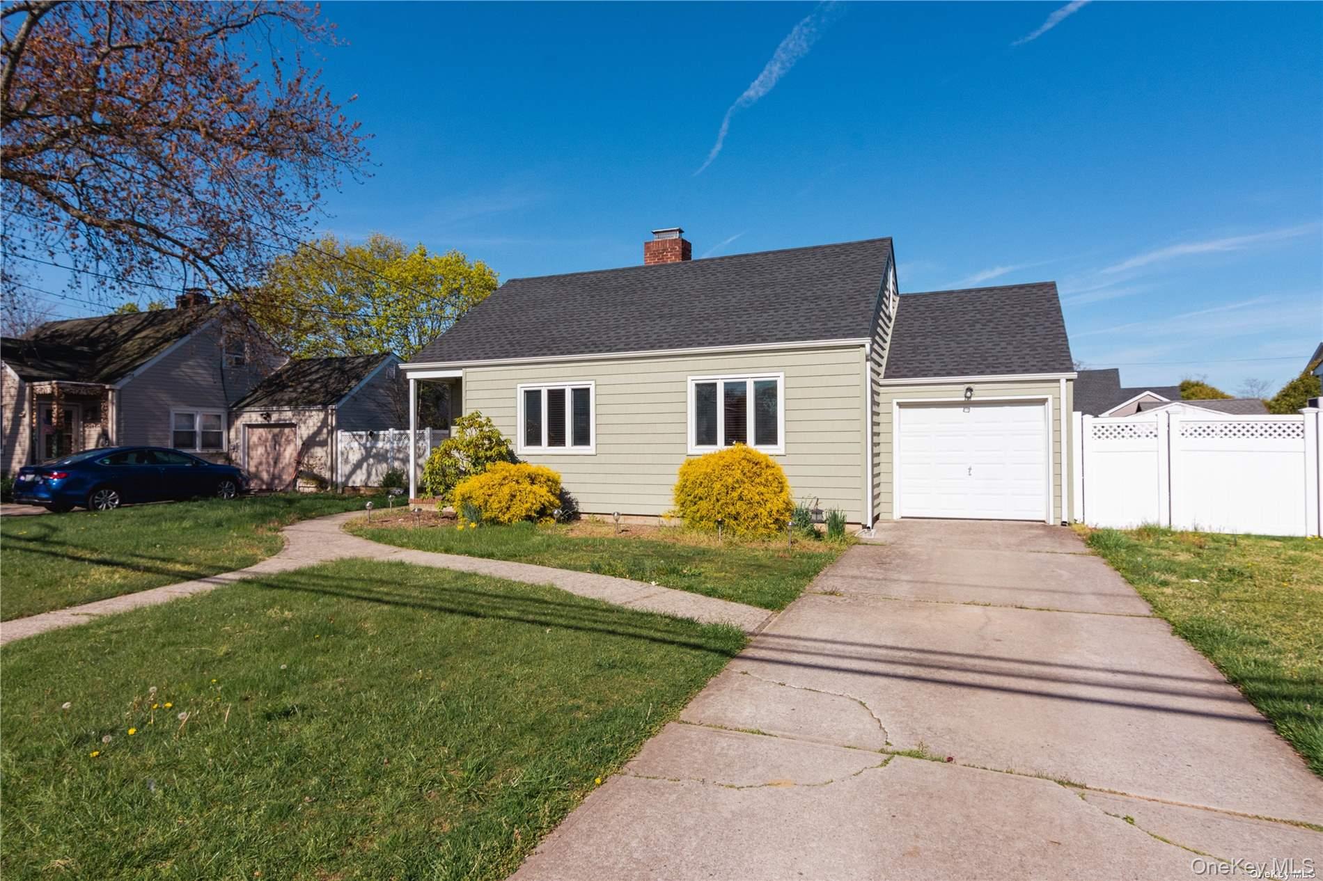 22 Carman Boulevard, Massapequa, NY 11758