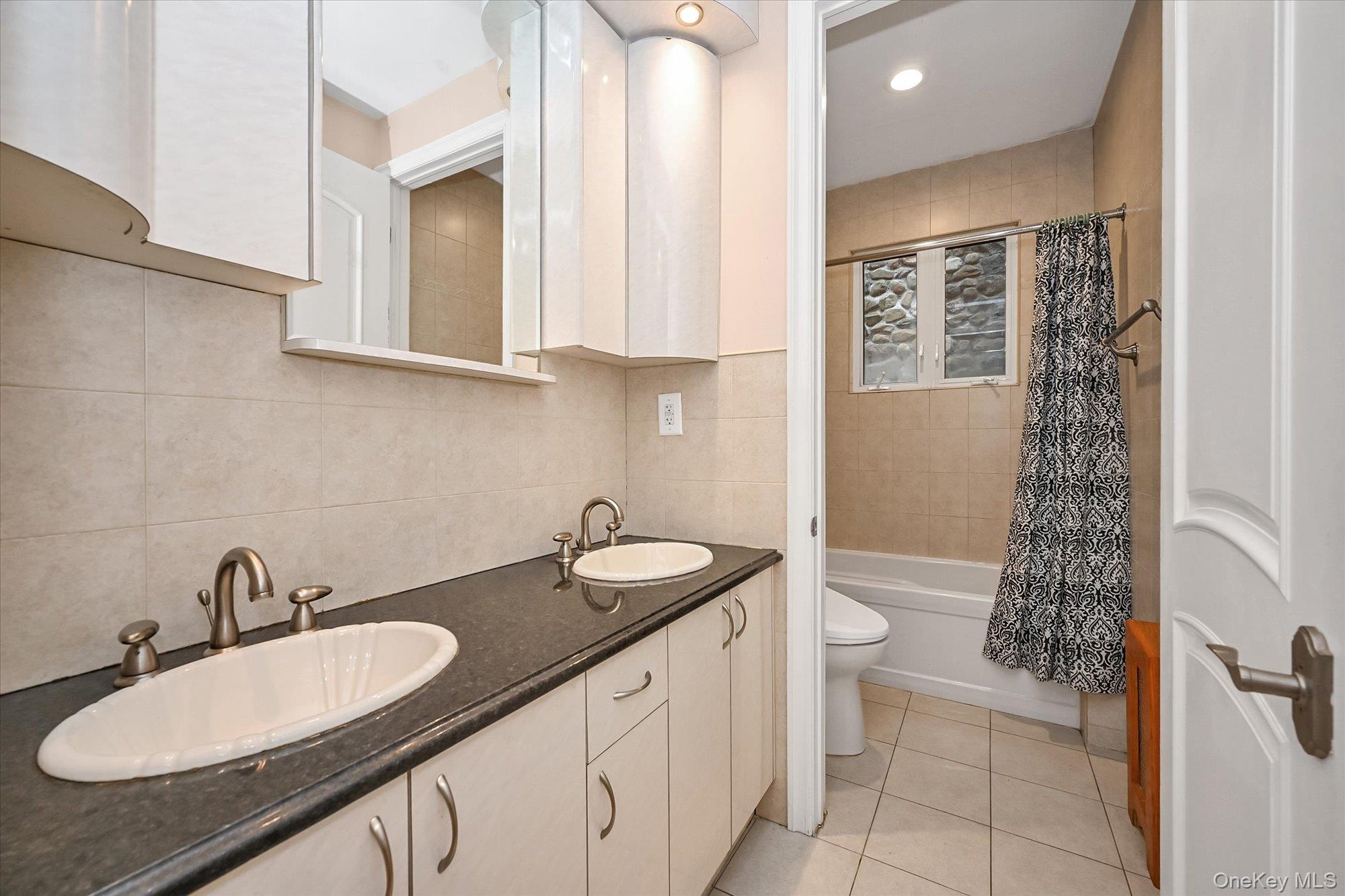 7716 Kew Forest Lane, Forest Hills, NY 11375