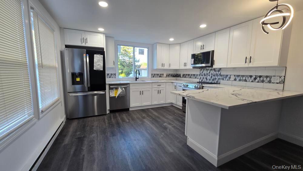 135 Village Circle W, Manorville, NY 11949