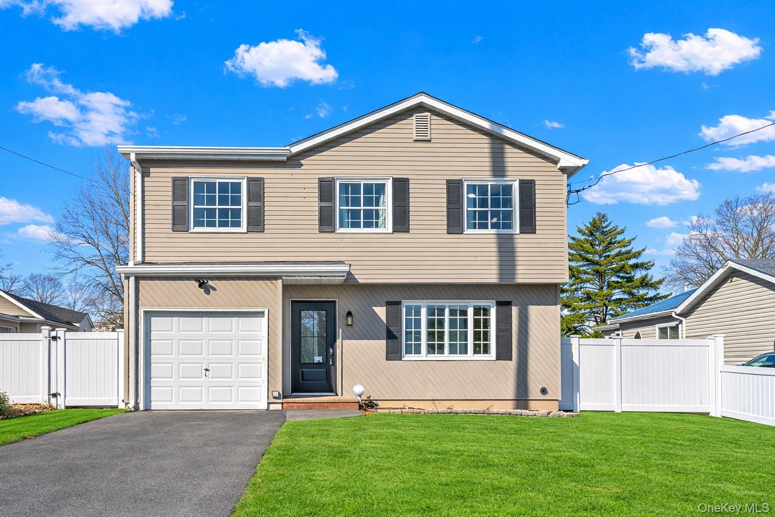 214 Woodycrest Drive, Holtsville, NY 11742