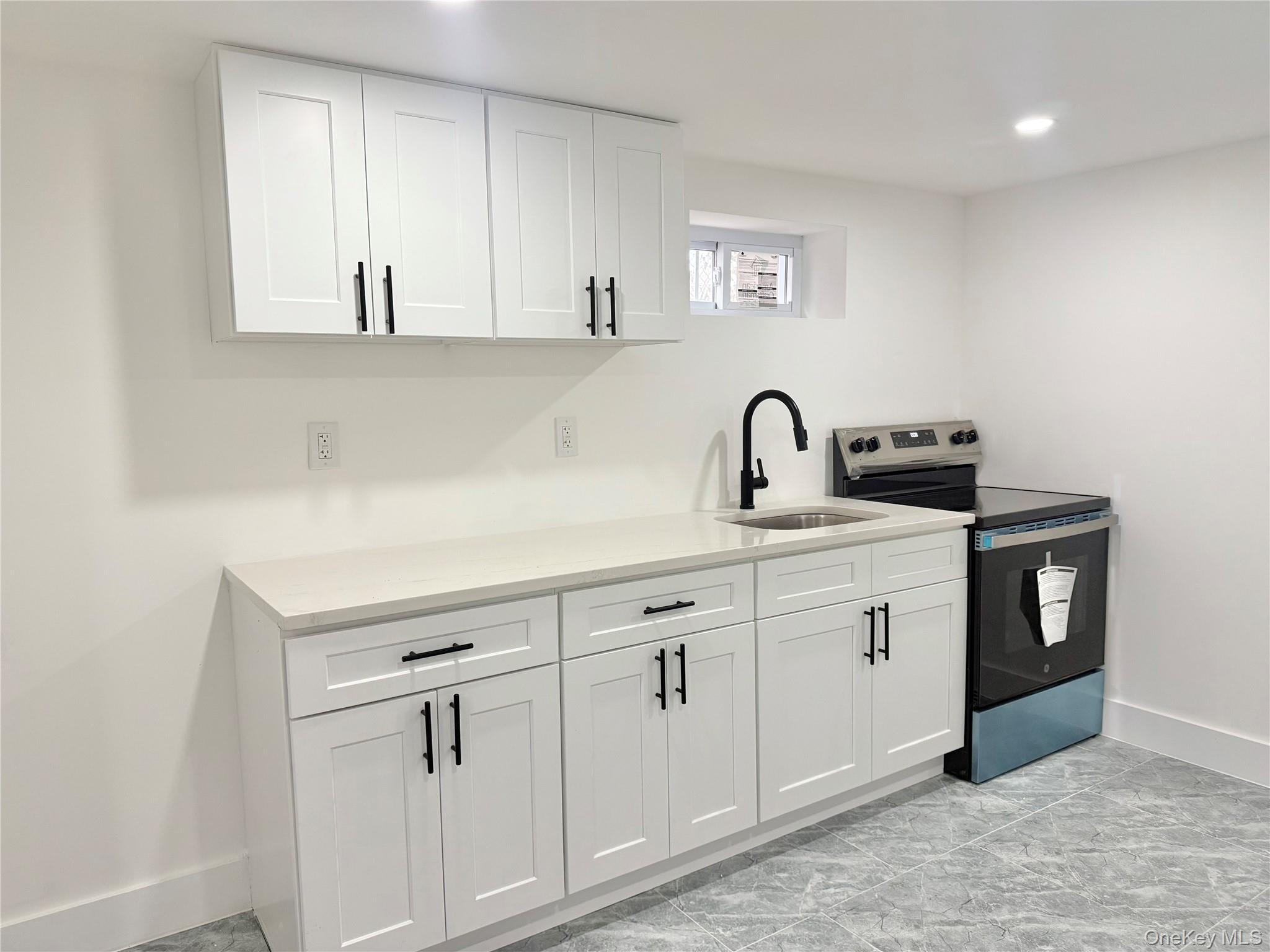 12323 Milburn Street, Springfield Gardens, NY 11413