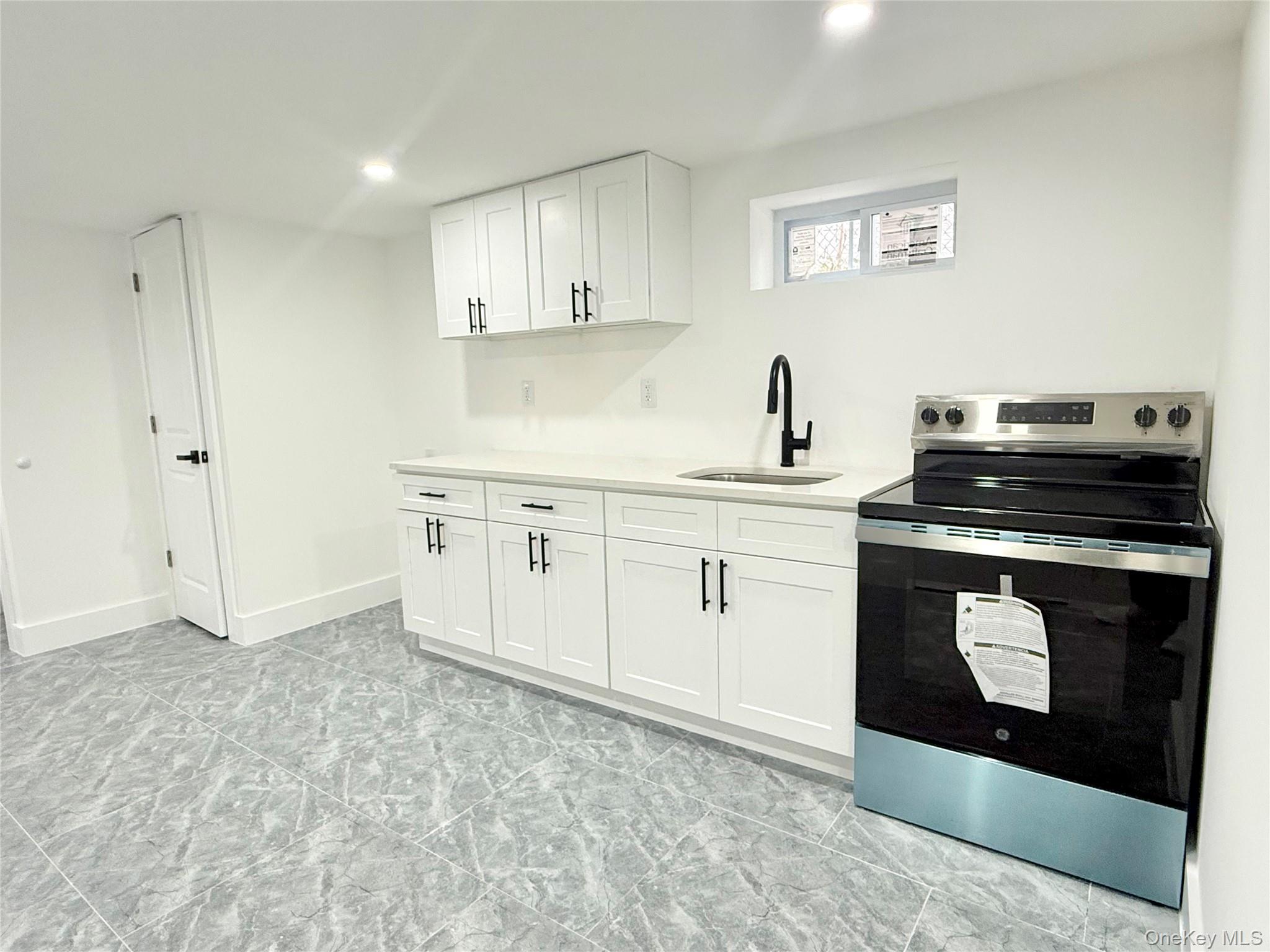 12323 Milburn Street, Springfield Gardens, NY 11413