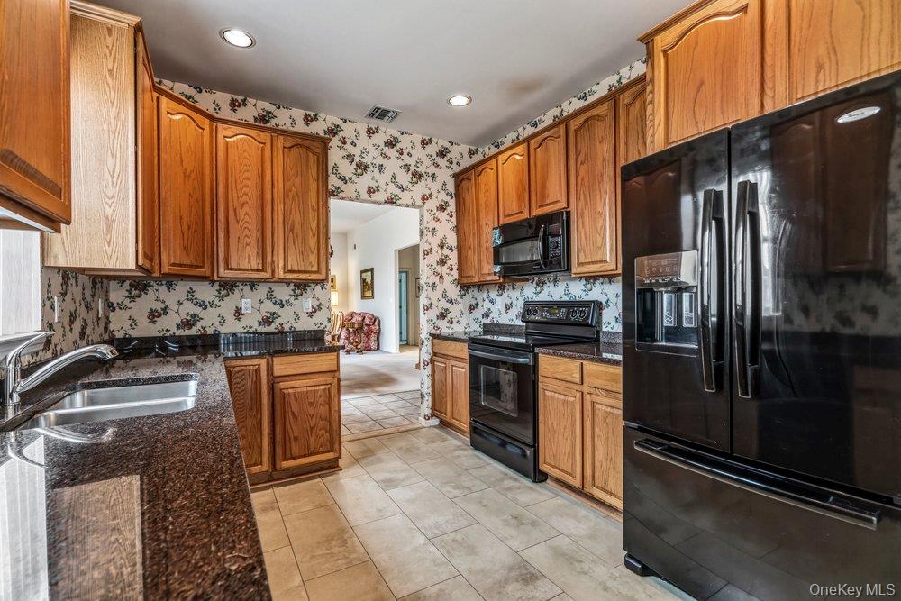 587 Leisure Drive, Ridge, NY 11961