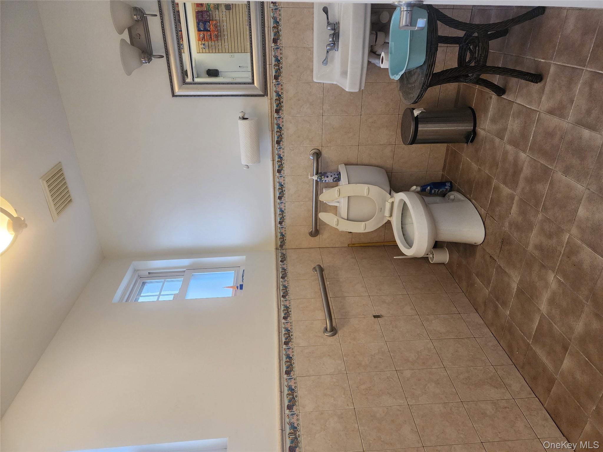 377 Woodcleft Avenue, Freeport, NY 11520