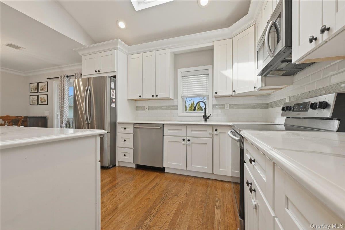 1419 Eric Lane, East Meadow, NY 11554