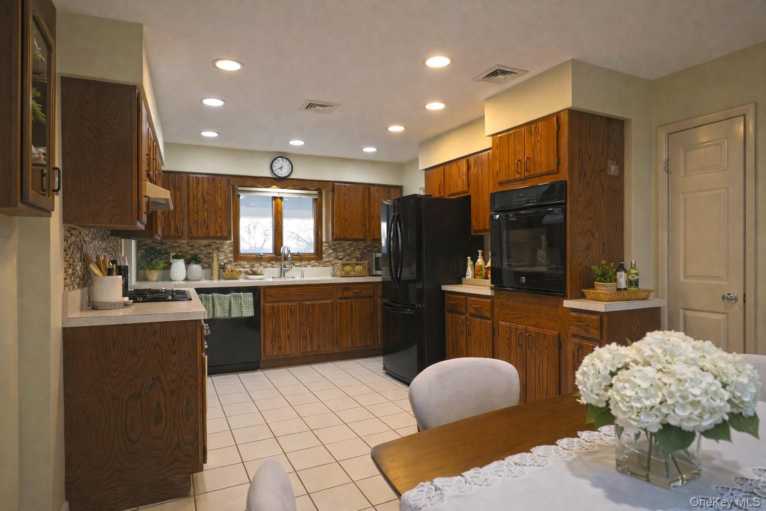 18 Strathmore Village Drive, South Setauket, NY 11720