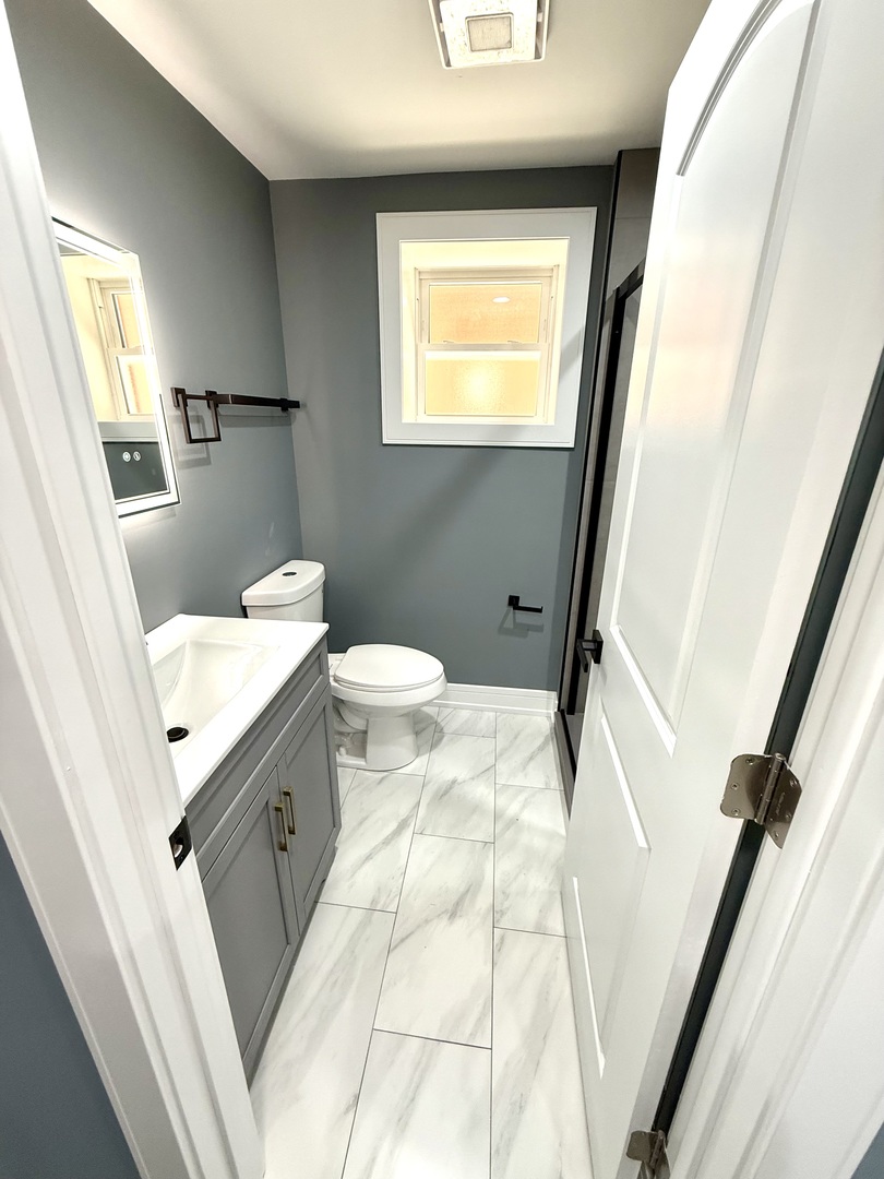 7042 S Eberhart Avenue, Chicago, IL 60637