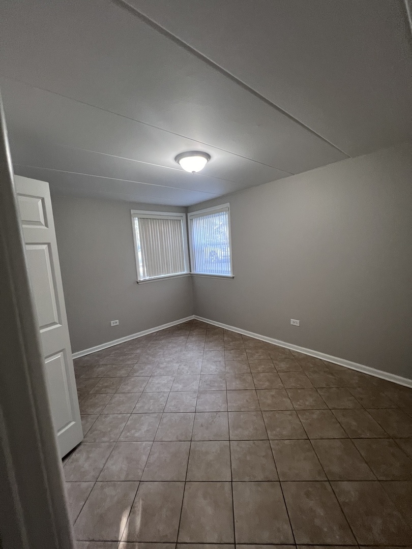 10931 S LLOYD Drive #1B, Worth, IL 60482
