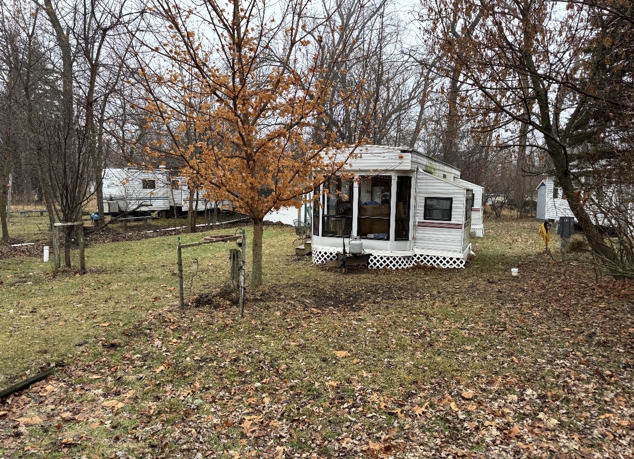 23-121 Woodhaven Lakes, Sublette, IL 61367