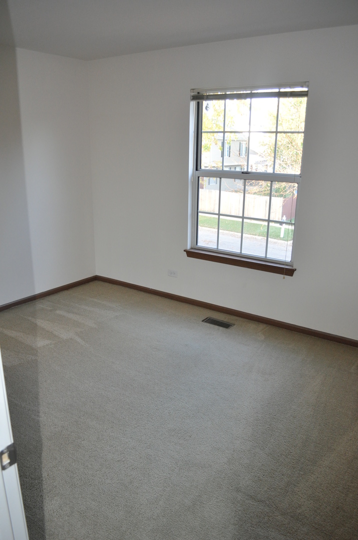 15 Whispering Drive, Streamwood, IL 60107