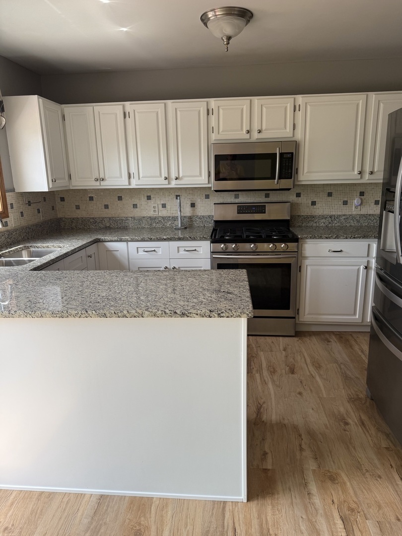 223 Williamsburg Court, Montgomery, IL 60538